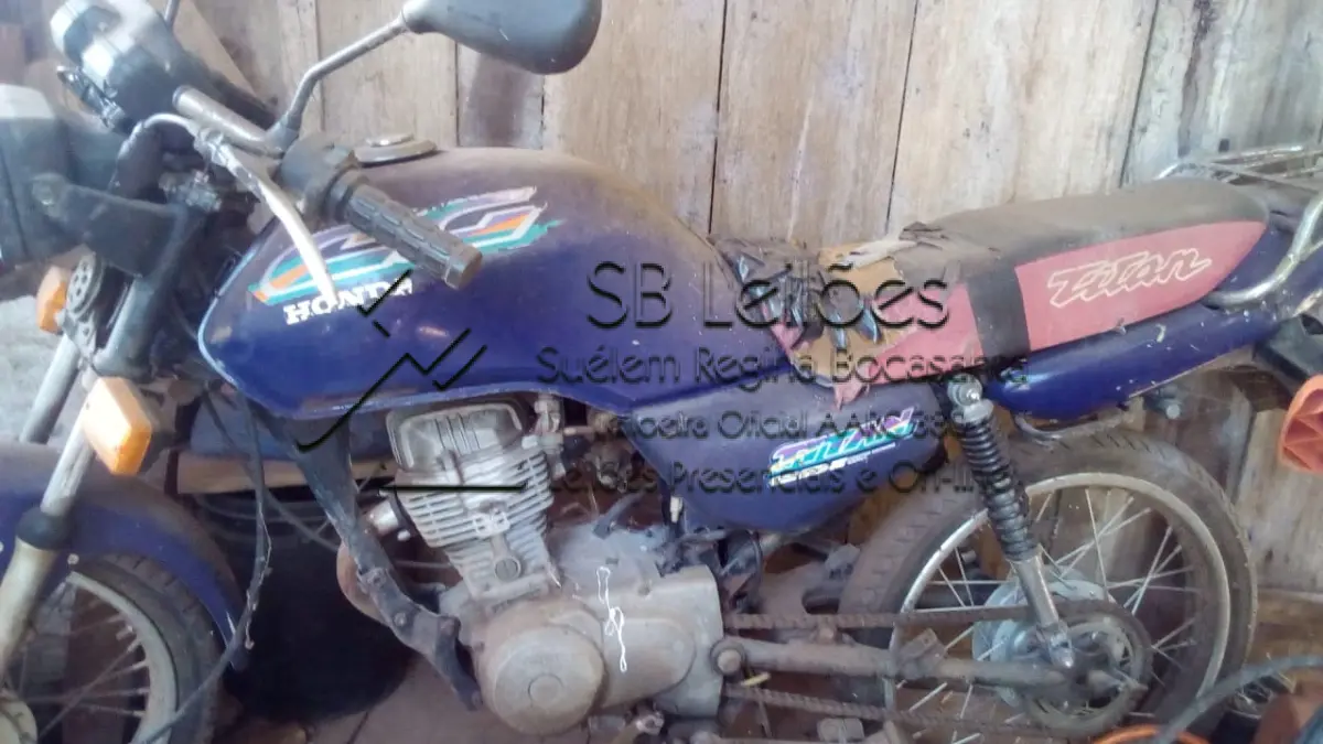 LOTE 001 - Motocicleta Honda CG Titan 125, placa LYQ 5113, ano 1997