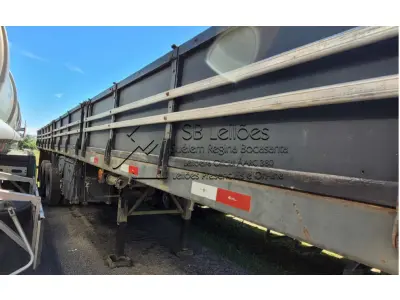 LOTE 001 - Caminhão Scania T112 ES 6X4 e Semi-reboque da carga seca, Guerra