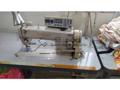LOTE 001 - Uma máquina de costura Reta Eletrônica Automática, marca Sun Star