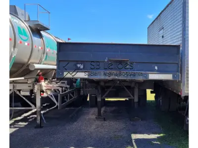 LOTE 001 - Caminhão Scania T112 ES 6X4 e Semi-reboque da carga seca, Guerra