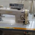 LOTE 001 - Uma máquina de costura Reta Eletrônica Automática, marca Sun Star